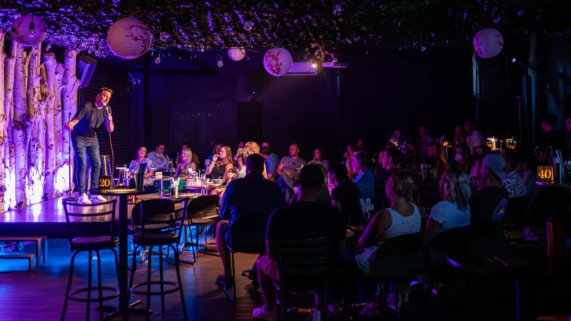 Denver Comedy Lounge — packed audience enjoying live stand-up comedy