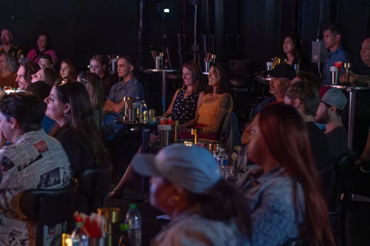 Guests celebrating at Denver Comedy Lounge — laughter and good times